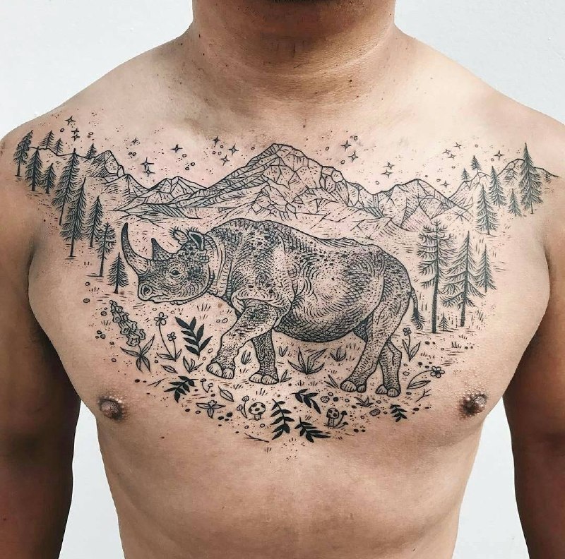 Rhinoceros tattoo on the chest for men