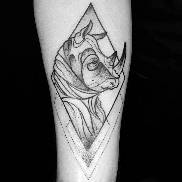 Rhinoceros tattoo on the forearm for men