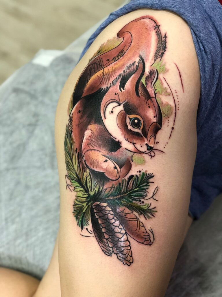 Squirrel tattoo on the thigh for women