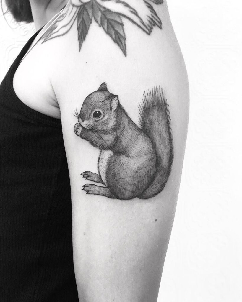 Squirrel shoulder tattoo for women