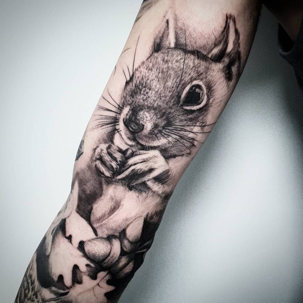 Tattoo of a squirrel on the arm for women