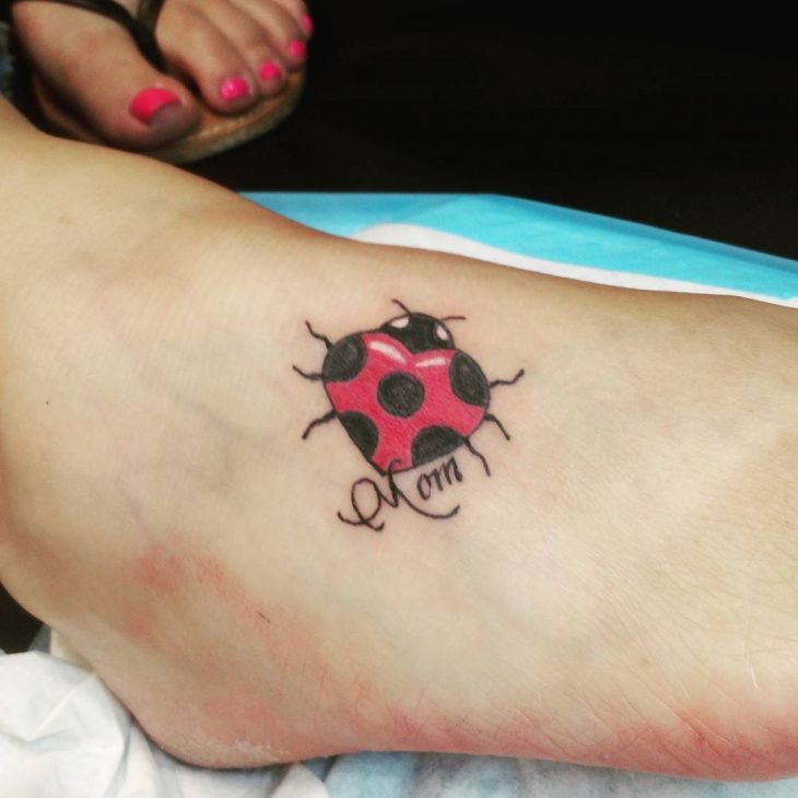 Ladybug tattoo on ankle for women