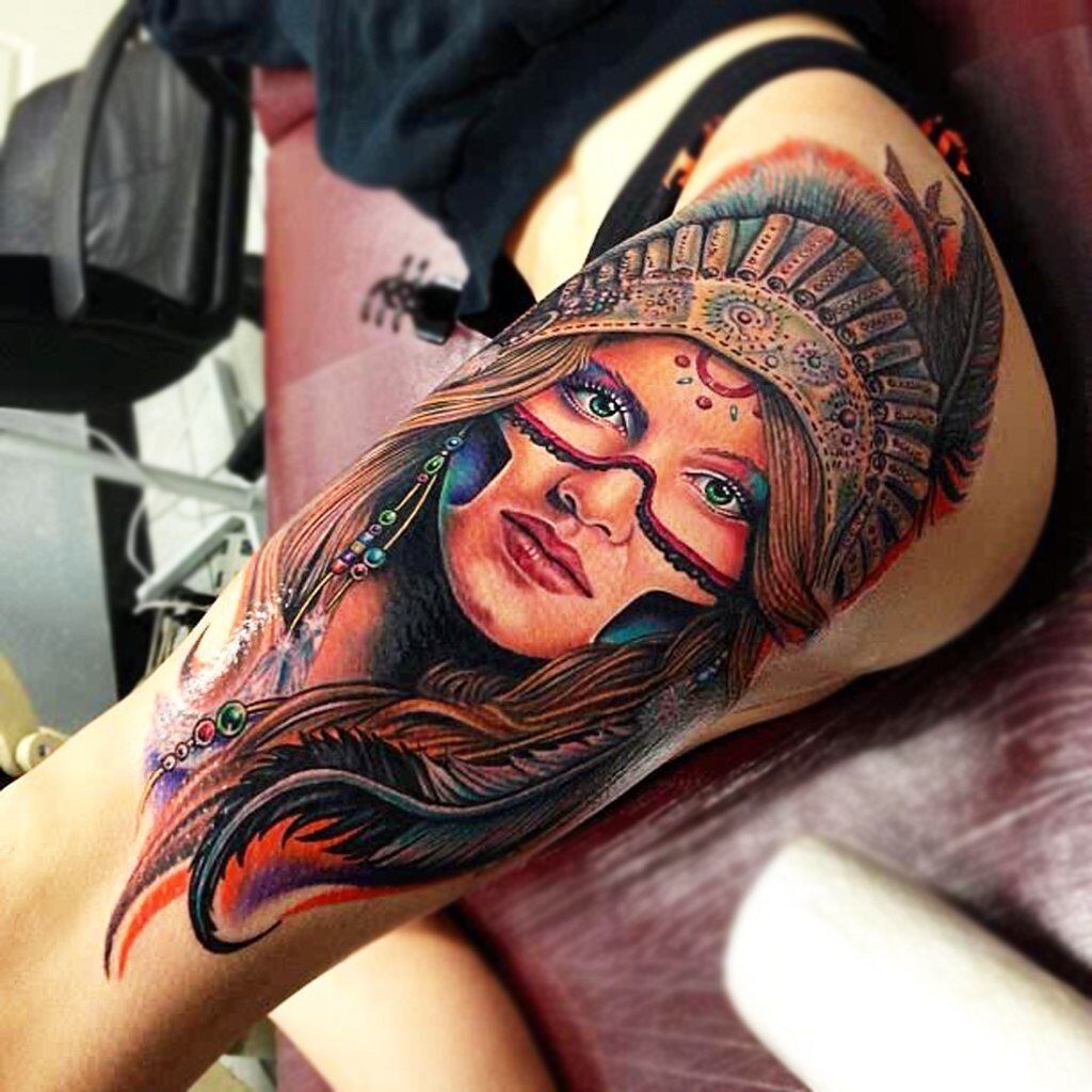 Indian tattoo on the hip for women