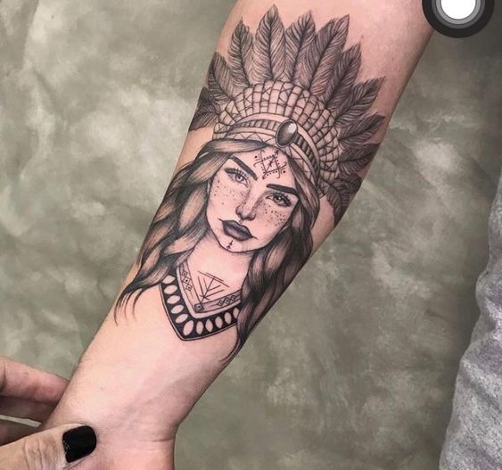 Indian tattoo on the forearm for women