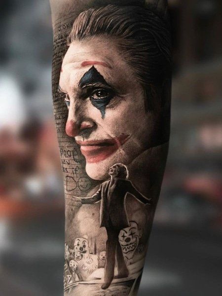 Joker tattoo on the arm