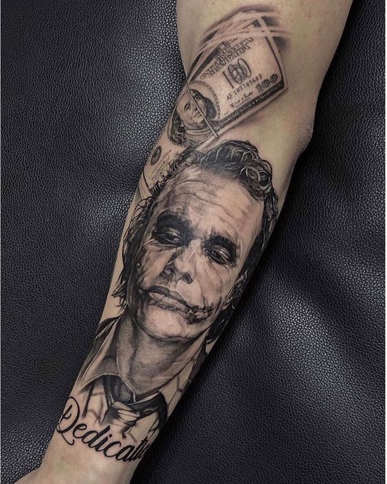 Joker tattoo on the arm