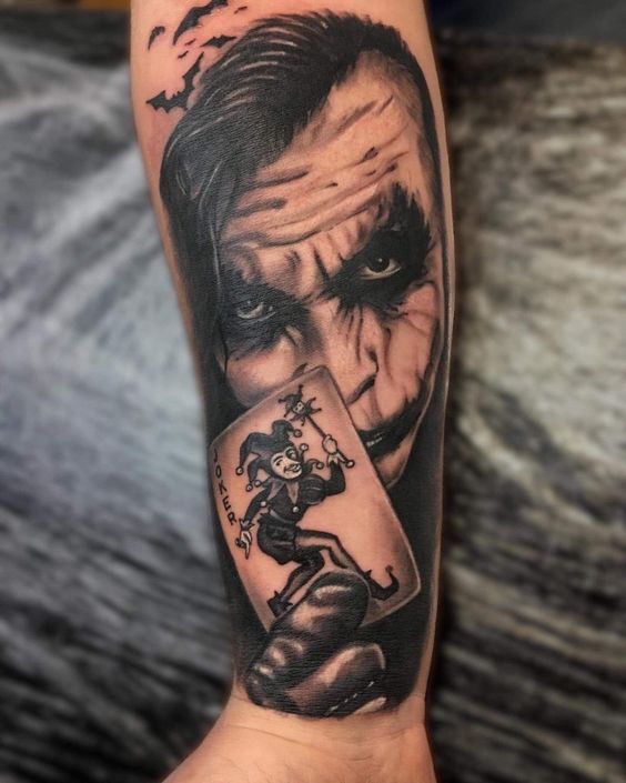 Joker tattoo on the forearm for men