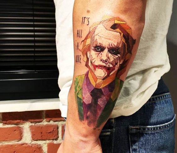 Joker tattoo on the forearm for men