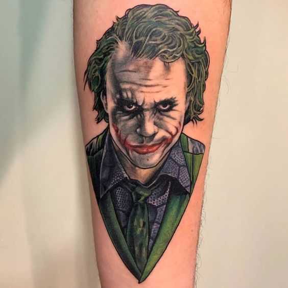 Joker tattoo on the forearm for men