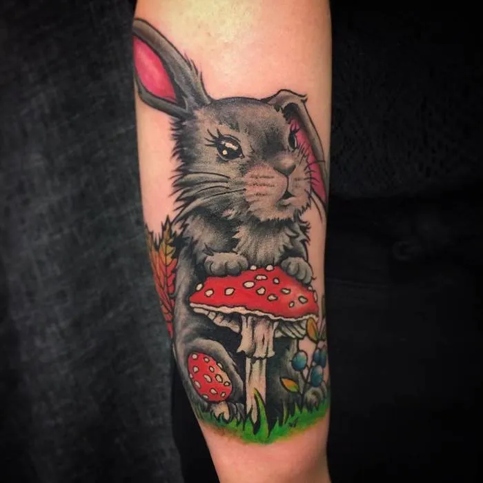 Tattoo of a hare (rabbit) on the forearm for women