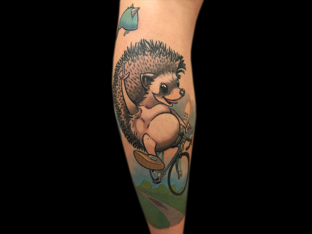 Tattoo of a hedgehog on a calf for men