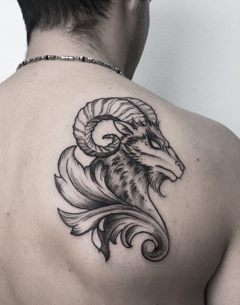 Tattoo of a ram on the shoulder blade for men