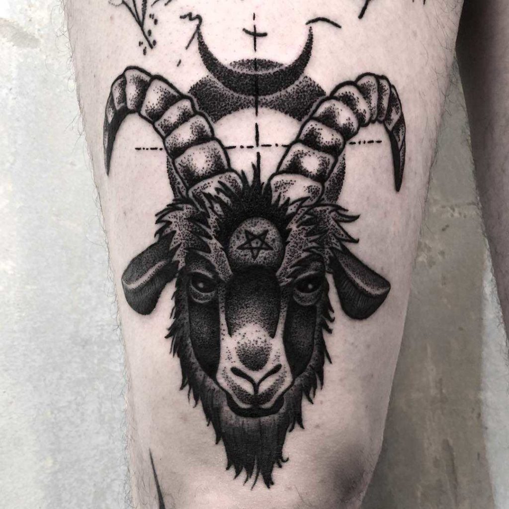 Ram tattoo on thigh