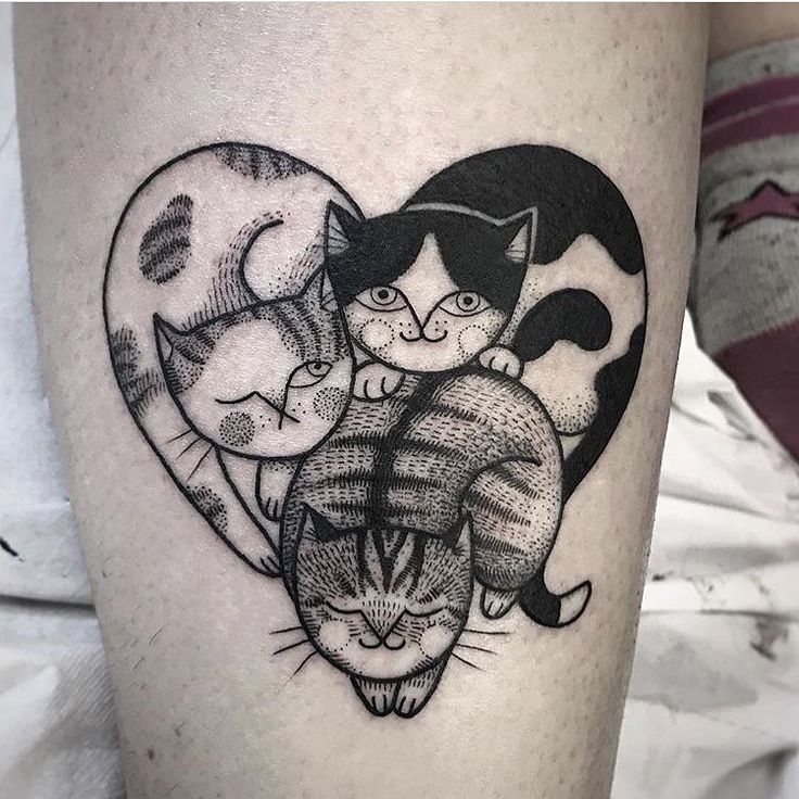 Cat tattoo on the leg for women