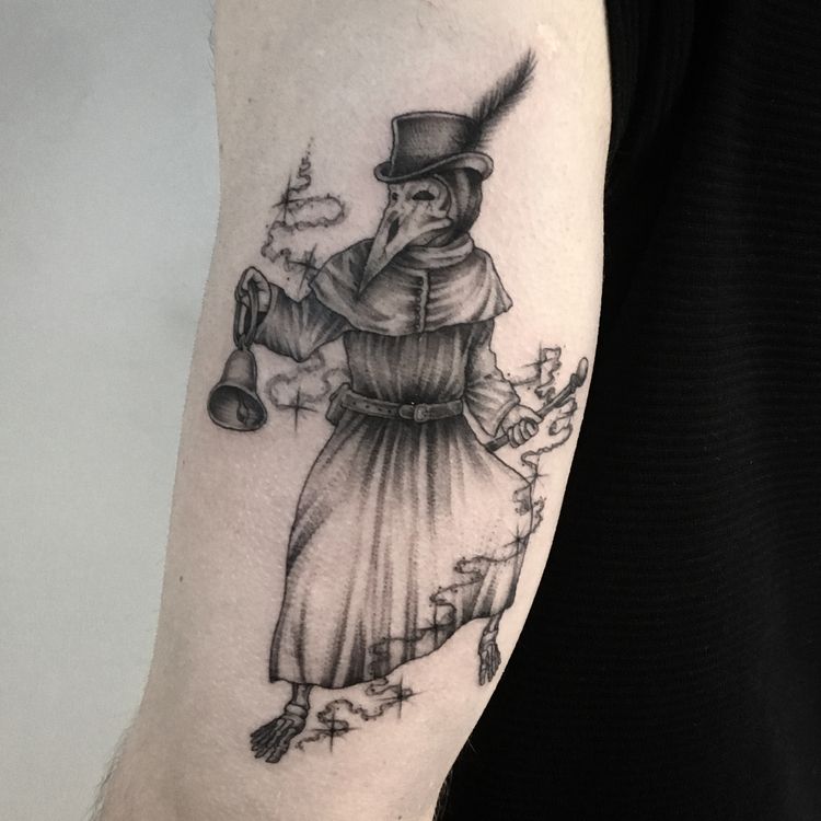 Plague doctor tattoo on the shoulder for men