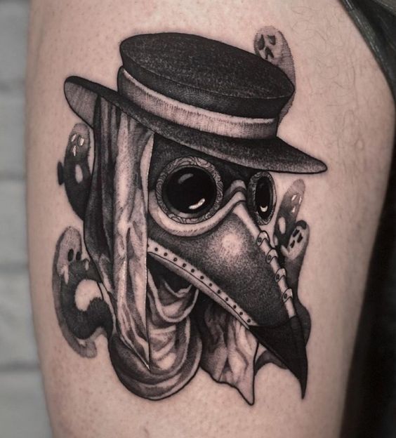 Tattoo of a plague doctor on the leg