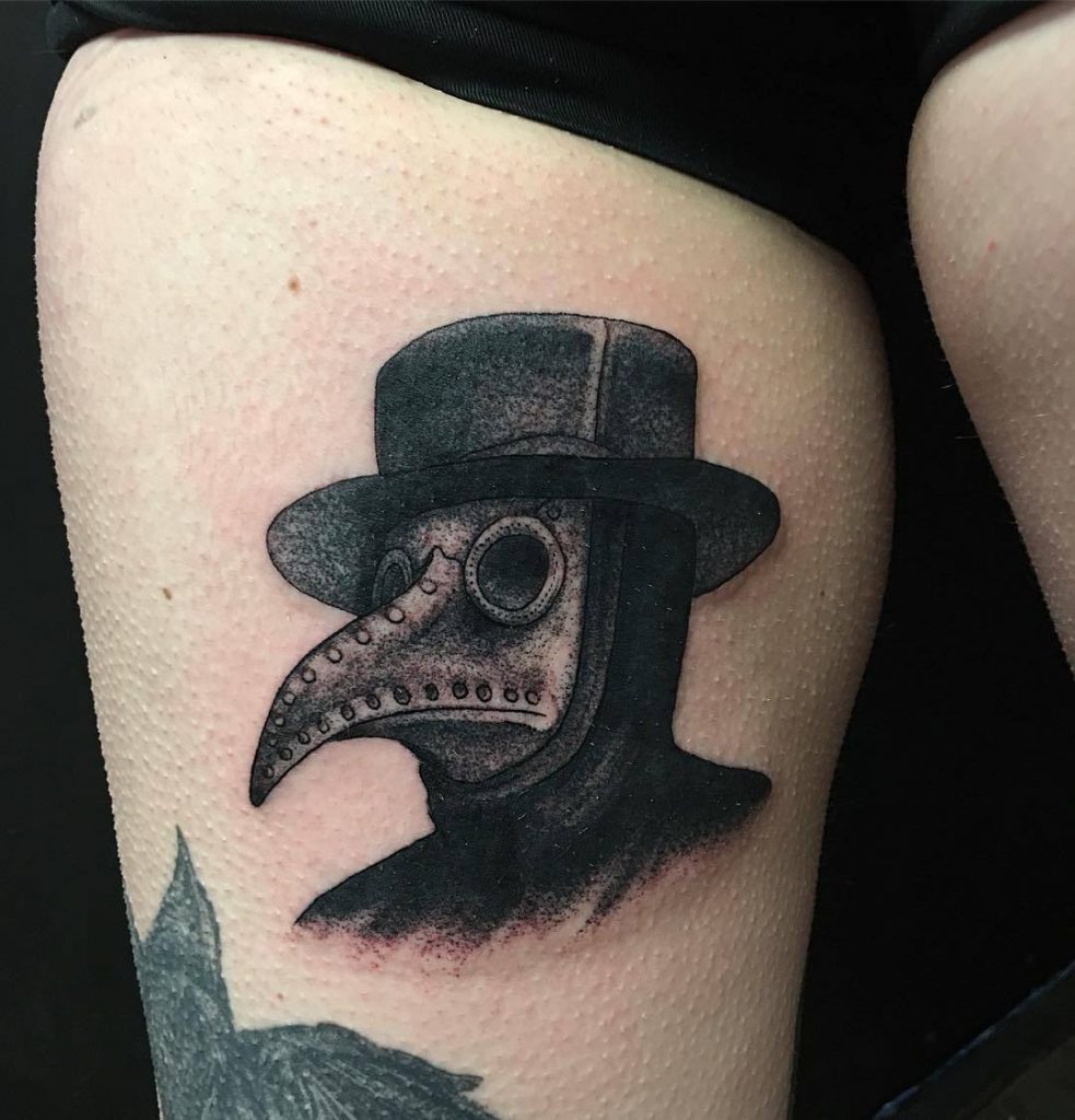 Plague doctor tattoo on the thigh for women