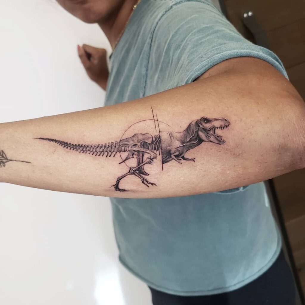 Tattoo of a dinosaur on the forearm for men