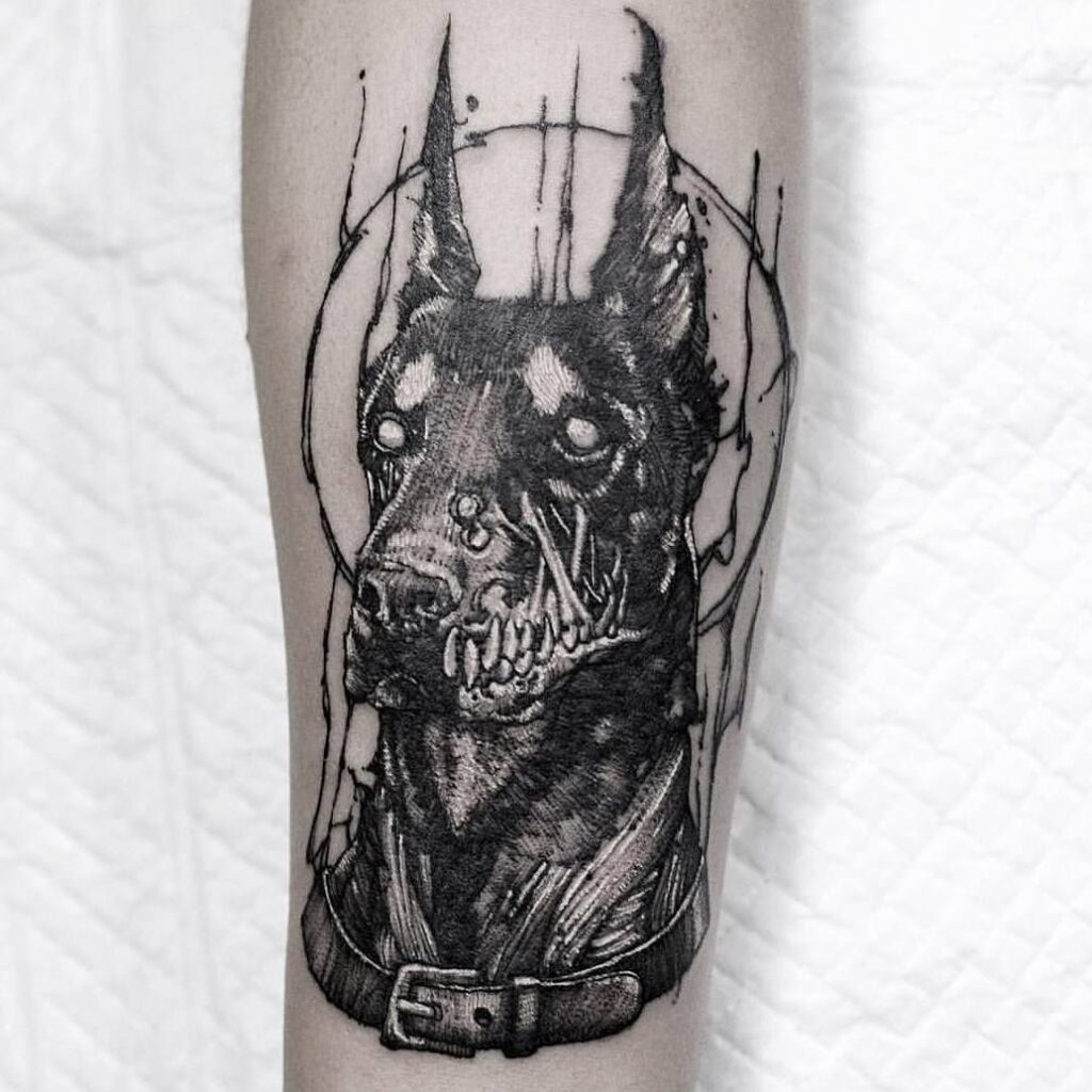 Doberman tattoo on the leg