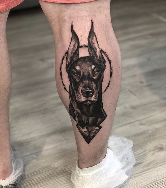 Doberman tattoo on the calf for men