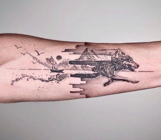 Tattoo of a wolf on the forearm for men