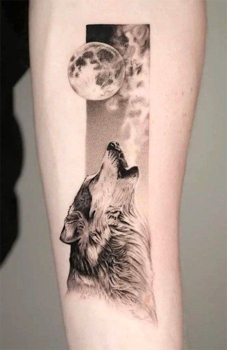 Tattoo of a wolf on the forearm for men