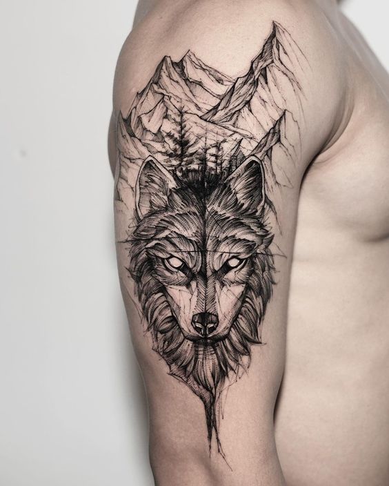 Tattoo of a wolf on the shoulder for men