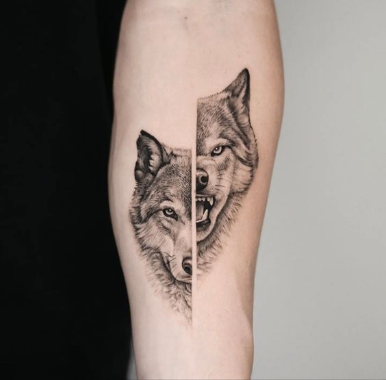 Tattoo of a wolf on the forearm for men