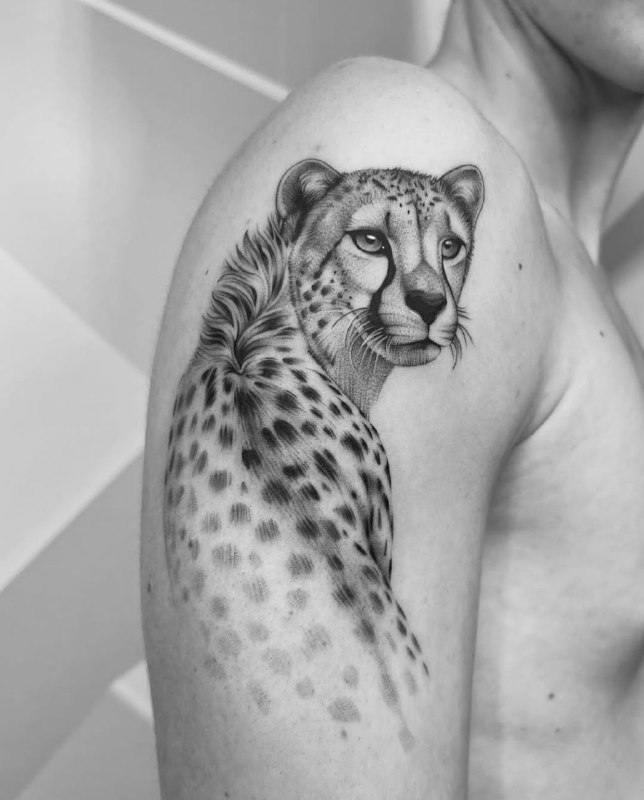 Cheetah tattoo on the shoulder for men