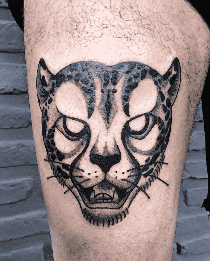 Cheetah tattoo on the hip for men