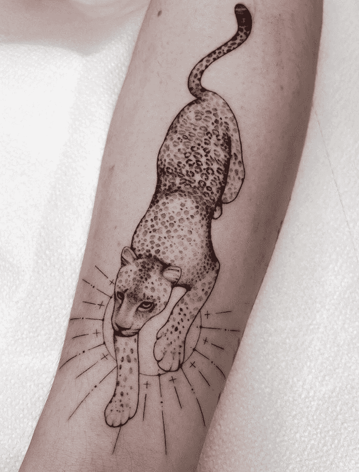 Cheetah tattoo on the arm for women