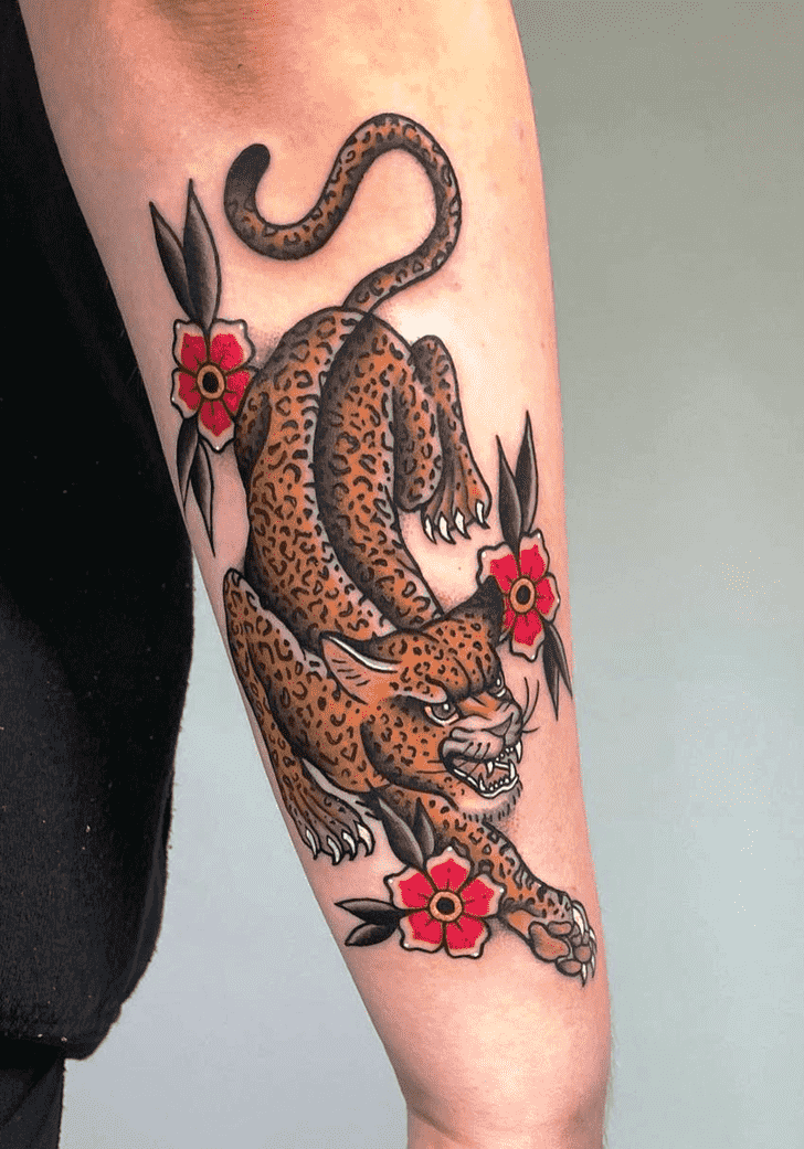 Cheetah tattoo on forearm for men