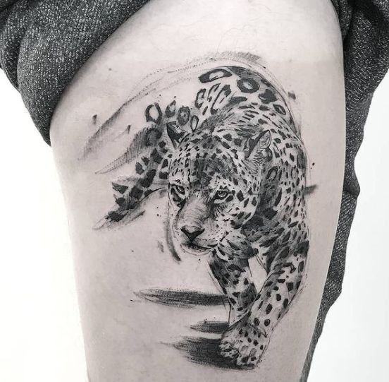 Leopard tattoo on the hip for men