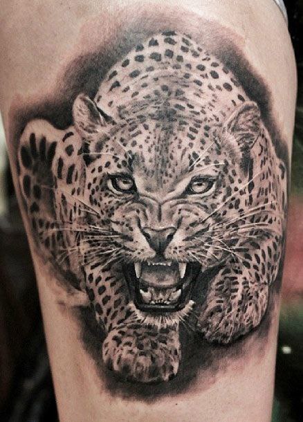 Leopard tattoo on the shoulder for men