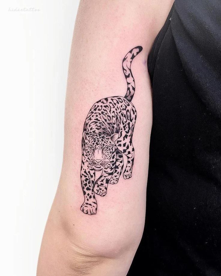 Leopard tattoo on the shoulder for women