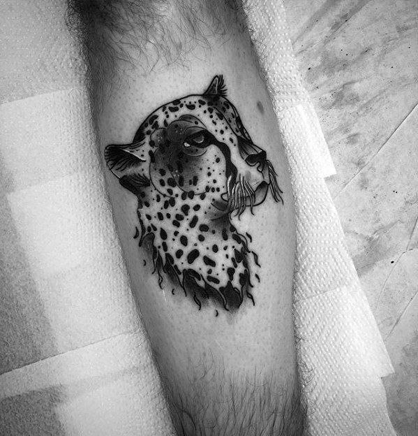 Cheetah tattoo on the calf for men