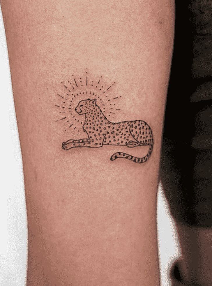 Cheetah tattoo on the arm for women