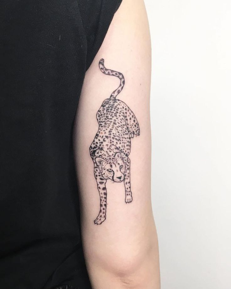 Cheetah tattoo on the shoulder for women