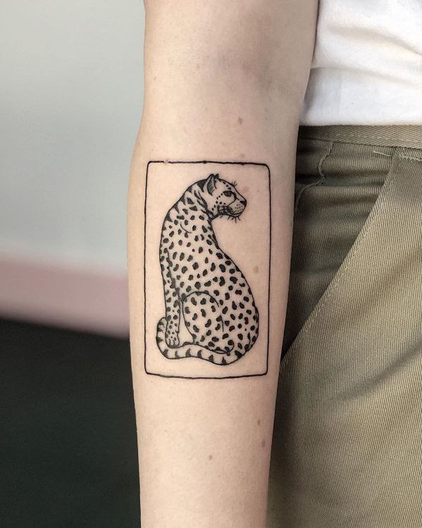 Cheetah tattoo on forearm for women