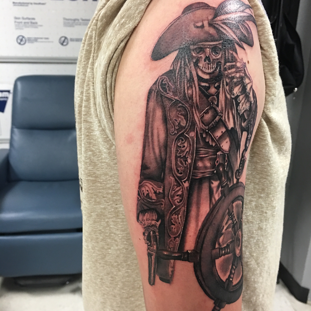 Pirate shoulder tattoo for men