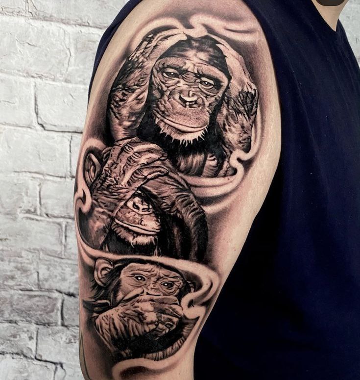 Monkey tattoo on the shoulder for men