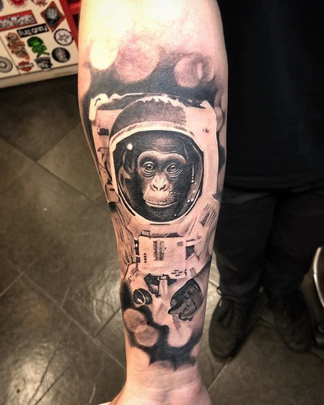 Monkey tattoo on the forearm for men