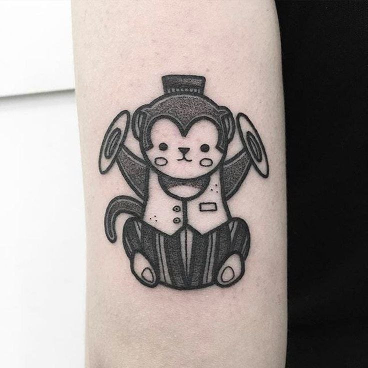 Monkey tattoo on the shoulder for women