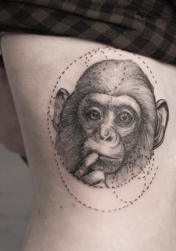 Monkey tattoo on the side for women