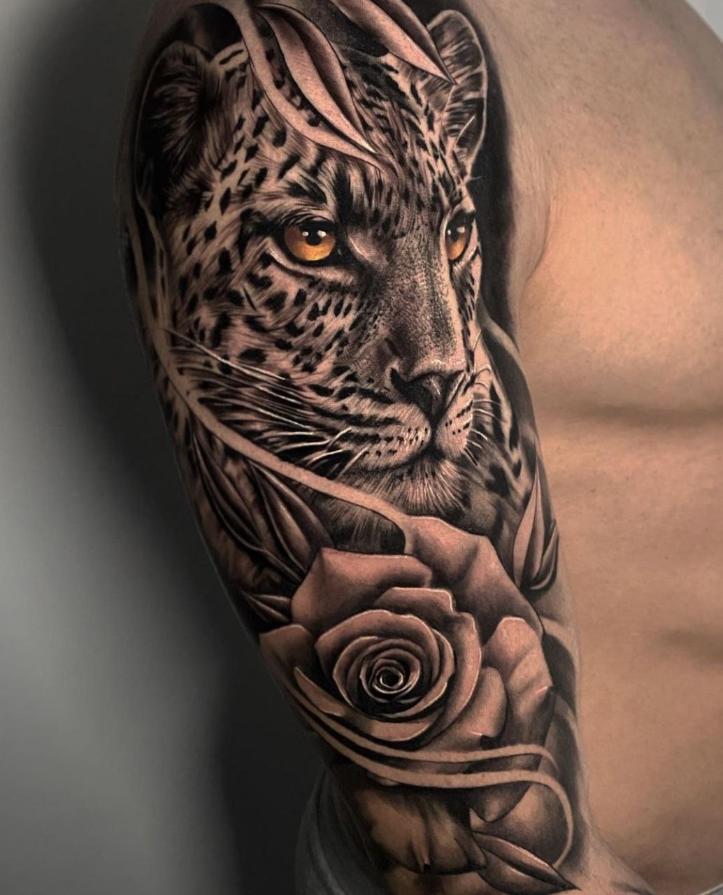 Leopard tattoo on the arm for men