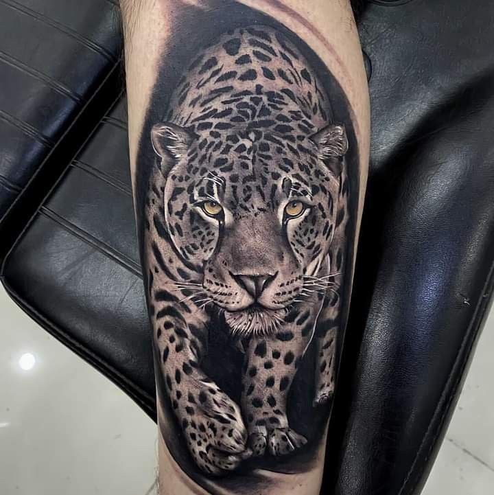 Leopard tattoo on the forearm for men