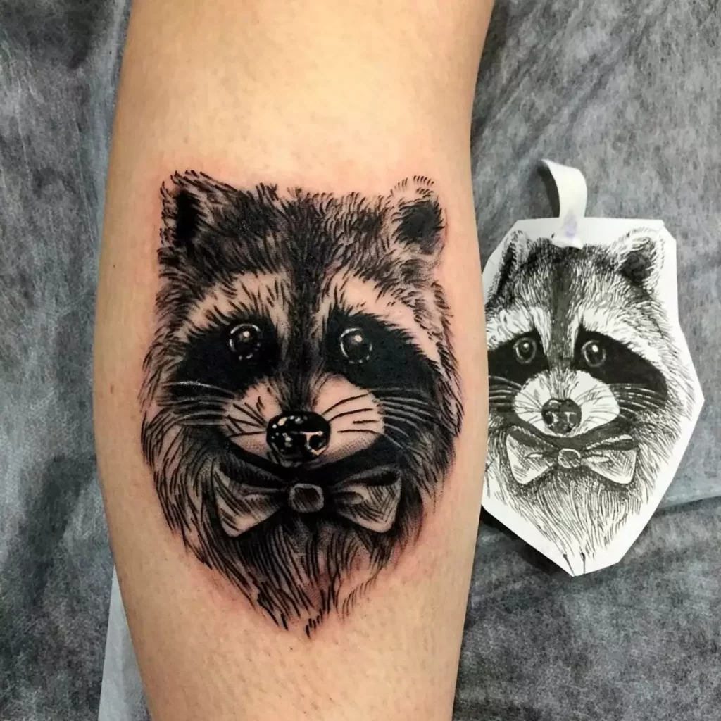 Raccoon tattoo on the calf for men