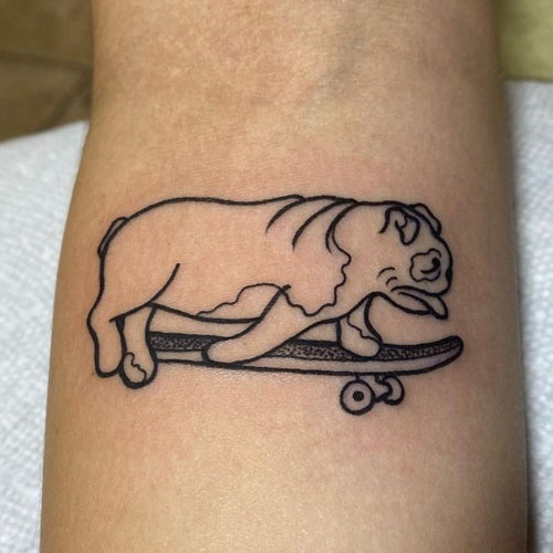 Bulldog tattoo on the arm for women