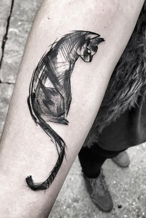 Cat tattoo on the forearm for men