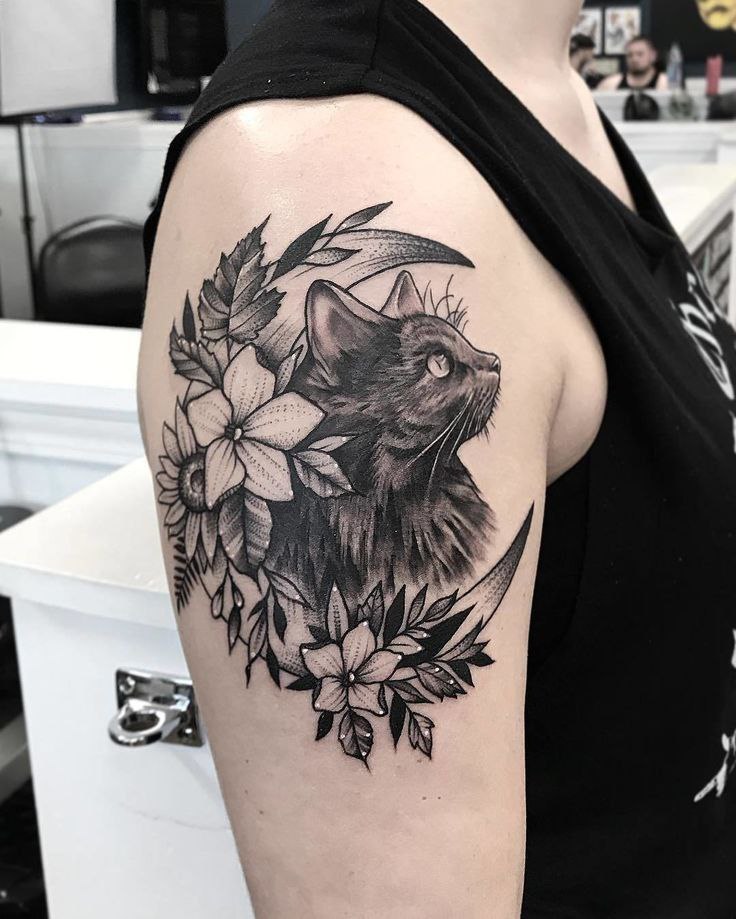 Cat tattoo on the shoulder for men